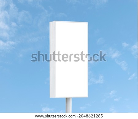 Outdoor billboard on blue sky background with white background mock up. clipping path