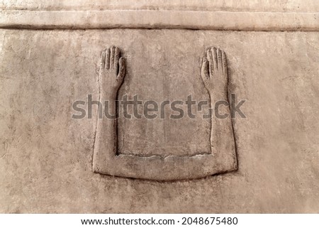 wall relief at Karnak Temple showing the Egyptian Ka Symbol . Luxor .Egypt. Royalty-Free Stock Photo #2048675480