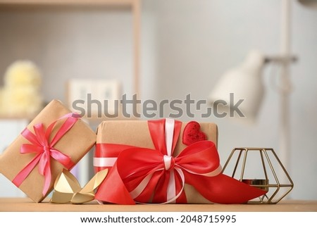 Gifts for Valentine's Day and decor on table