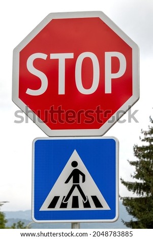 Crosswalk and Stop traffic sign.