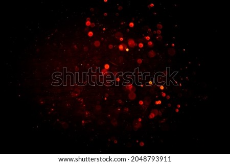 Abstract red bokeh with black background