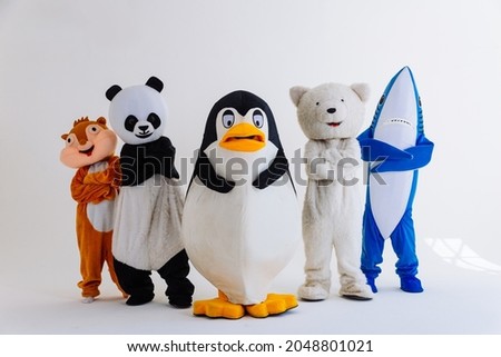 Group of mascots doing party. Concept about carnival, animals rights and lifestyle Royalty-Free Stock Photo #2048801021