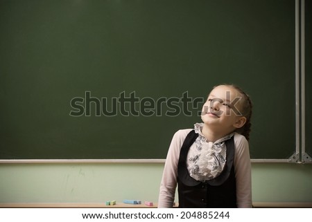 beautiful girl at the blackboard
