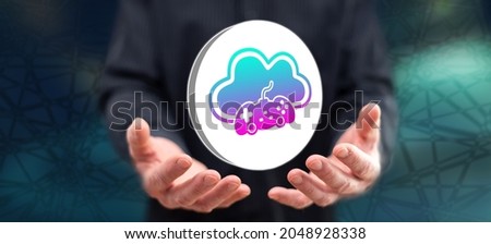 Cloud gaming concept above the hands of a man in background