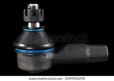 Tie rod end, steering tie rod end, car spare parts, isolated on black background Royalty-Free Stock Photo #2049030290