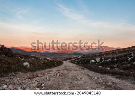 Low Angle Walking Hiking Trekking Path Trail Scottish Highlands Mountain Range Cairngorms Blue View Sky Background Travel Outdoors Holiday Sunrise Destination Morning Beautiful Rocky Foreground