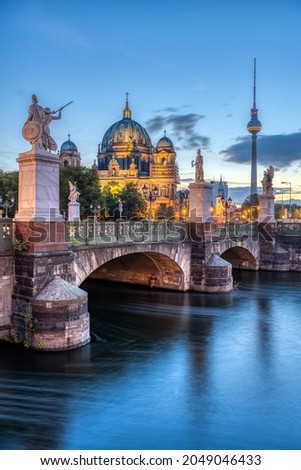 The Cathedral, the TV Tower and the Schlossbruecke in Berlin before sunrise Royalty-Free Stock Photo #2049046433