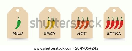 Spicy chili pepper sauce level scale on labels. Traditional Mexican and Chinese spicy food in four levels and colors - mild, spicy, hot and extra. Vector illustration isolated on a white background.