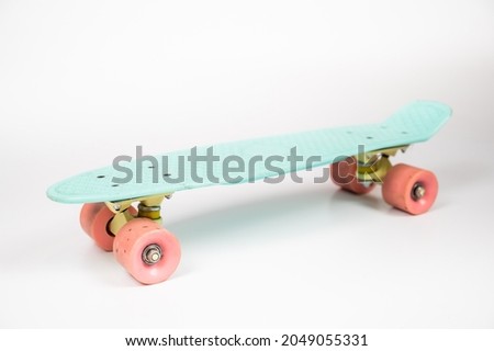 Blue penny board on a white background. isolate.