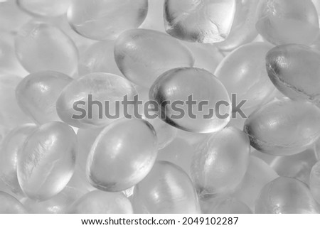 Transparent granules of polypropylene or polyamide. background. Plastics and polymers industry. Copy space.	 Royalty-Free Stock Photo #2049102287