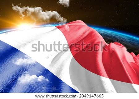France national flag cloth fabric waving on beautiful sky.