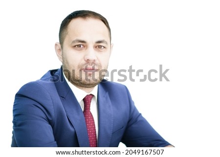 Business style. Business people. Manager. Director in the office. A man in a suit looks at the camera on a white background.