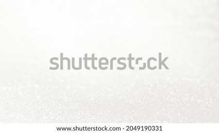 Abstract white bokeh glitter background. Blur background. Abstract background Royalty-Free Stock Photo #2049190331