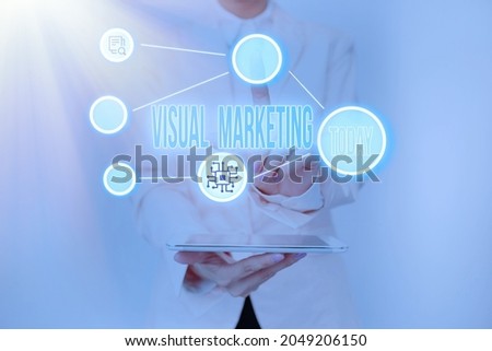 Handwriting text Visual Marketing. Business overview telling the story of your brand or product by creation Lady Holding Tablet Pressing On Virtual Button Showing Futuristic Tech.