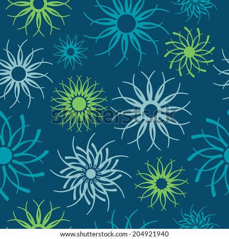 Abstract pinwheel pattern in blues and green repeats seamlessly.