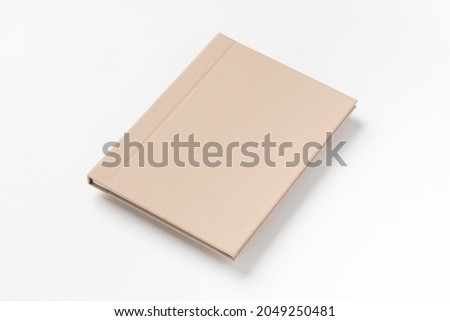 Brown hardcover book, isolated on white background
