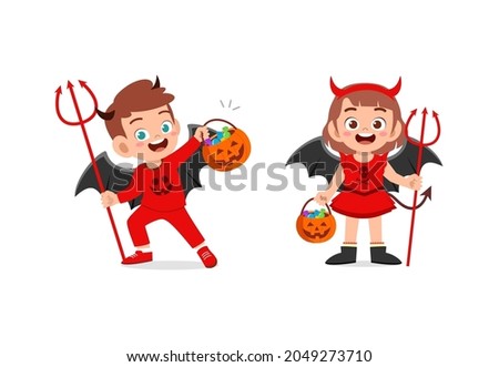 boy and girl celebrate halloween wear devil costume