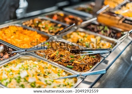 Traditional Asian food sold in an European shopping mall food court Royalty-Free Stock Photo #2049292559