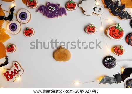 Step by step instructions on how to draw an orange pumpkin shaped gingerbread cookie using icing. Step 1, on isolated background is ginger dough pumpkin preparation. DIY make sweets Halloween treats