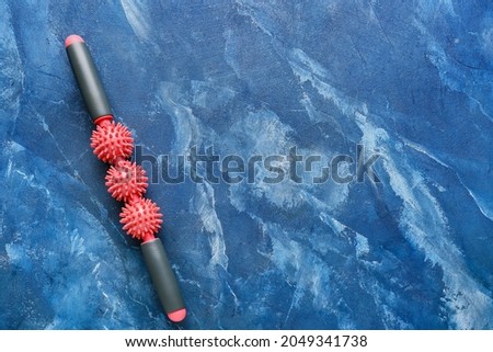 Body roller on color background