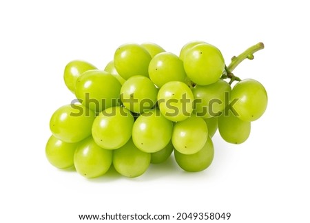 Shine Muscat grapes on a white background. White grapes. Japanese grapes.  Royalty-Free Stock Photo #2049358049