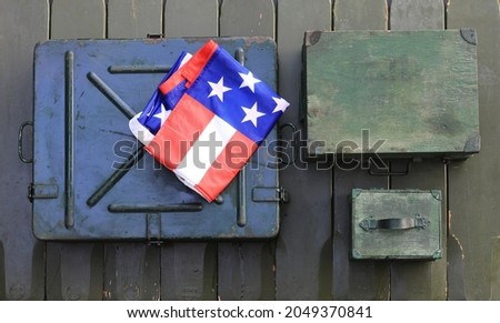 USA flag on military wooden background