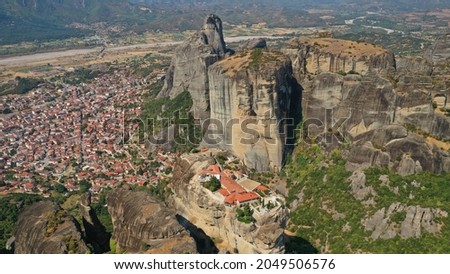 Aerial drone photo of Monastery of St. Charalambos at Meteora monasteries complex of immense natural pillars and hill-like rounded, an Unesco World Heritage site, Western region of Thessaly, Greece