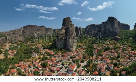 Aerial drone panoramic photo of iconic Kastraki village built on the slopes of Meteora monasteries complex an Unesco World Heritage site, Thessaly, Greece
