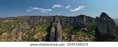 Aerial drone panoramic photo of iconic Meteora monasteries complex an Unesco World Heritage site, Thessaly, Greece