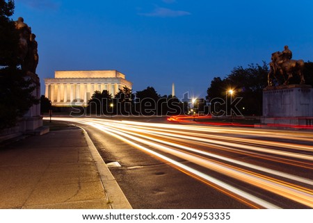 Light trail at Lincoln Memorial, seen from the Memorial bridge, Washington DC, USA.