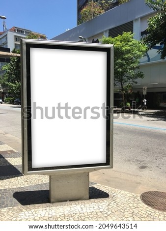 Ads Totem in Rio de Janeiro streets. Advertisement Panel Mockup. Outdoor Media Placeholder. Advertisement mockup for design and marketing. Royalty-Free Stock Photo #2049643514