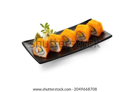 California maki sushi or California rolls or Masago maki sushi in black plate isolated on white background.