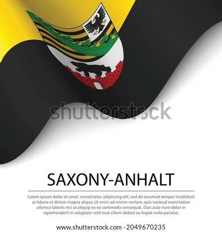 Waving flag of Saxony-Anhalt is a state of Germany on white background. Banner or ribbon vector template 