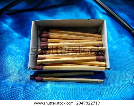 wooden matches in a small box