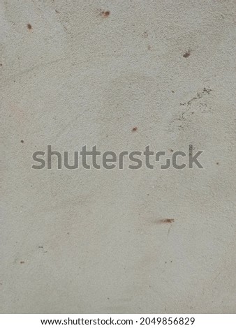 a layer of cement and sand, and water is polished on the wall, this photo is dry and smeared on the wall