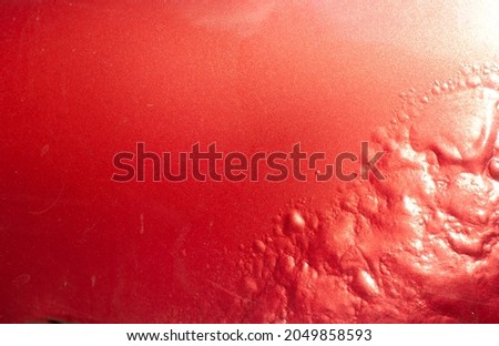 Corroded metal texture from an old car. Grunge texture in red. Royalty-Free Stock Photo #2049858593