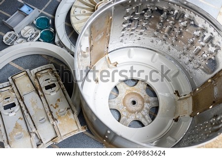 Laundry washing machine with mold,algae stains,cleaning of dirt laundry tub,preparing to remove and clear to eliminate the accumulation of germs inside washing machine drum and unpleasant bad smell Royalty-Free Stock Photo #2049863624