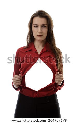 attractive businesswoman pulling her shirt apart doing a superhero business poses