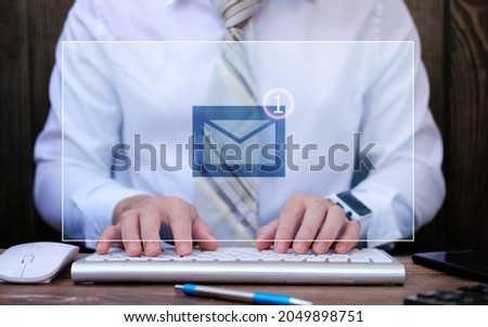 Email concept, Closeup businessman using computer with email icon, email marketing concept, person reading e-mail on computer, receive new message