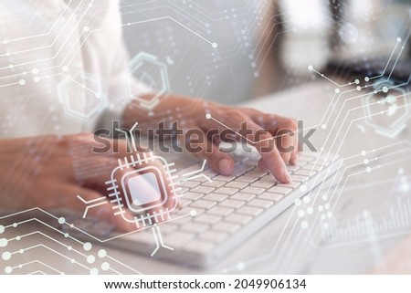 Woman typing the keyboard to create innovative software to change the world and provide a completely new service. Close up shot. Hologram tech graphs. Concept of Dev team. Formal wear.