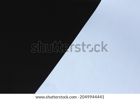 black and white color background composed of paper.