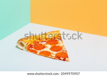 Slice of Pepperoni Pizza orange grey turquoise paper background modern