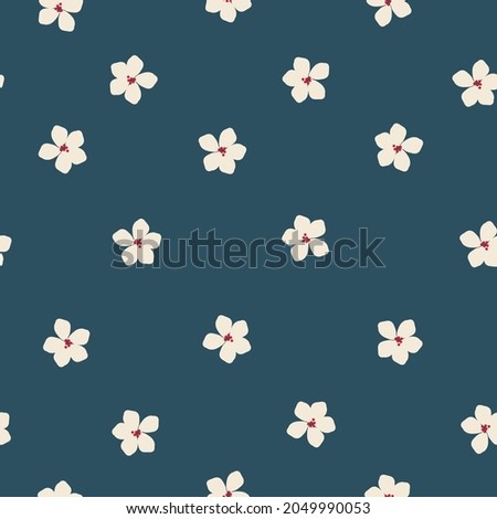 Seamless vintage pattern. cute white flowers on a dark blue background. vector texture. trend print for textiles, wallpaper and packaging.