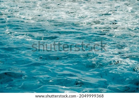 Water texture with small blue waves.
