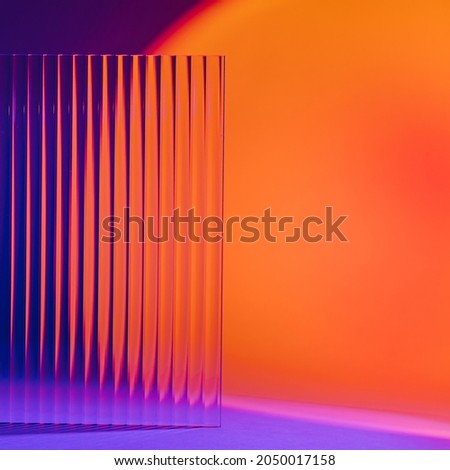 Colorful gradient background with ribbed acrylic plate Royalty-Free Stock Photo #2050017158