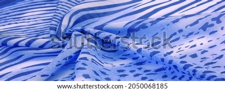 silk fabric with blue white stripes, zebra skin in African style. For the designer, the sketch of the layout, the entourage of the decorator. Background texture collection