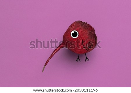 Creative artwork. Contemporary art collage of cute and funny beetroot with bird drawings isolated over pink background. Concept of funny meme emotions, humor, health, food. Copy space for ad