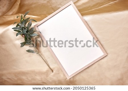 Minimalist mock - up frame background with olive tree branch. High quality photo