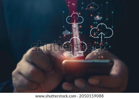Hand man using mobile phone for doing cloud uploading data on the Internet online.network,media,keyword,Digital Web,Photo concept information and Technology.