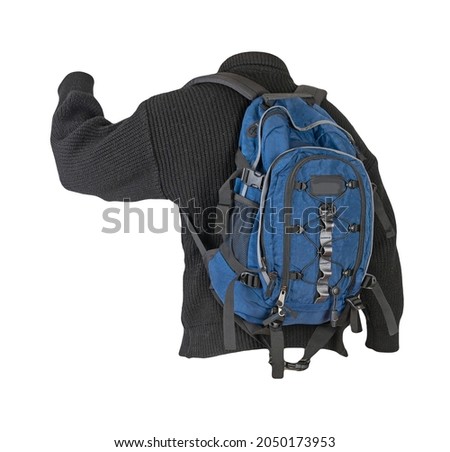  blue  backpack dressed in a knitted black  sweater isolated on a white background. backpack and male sweater view from the back